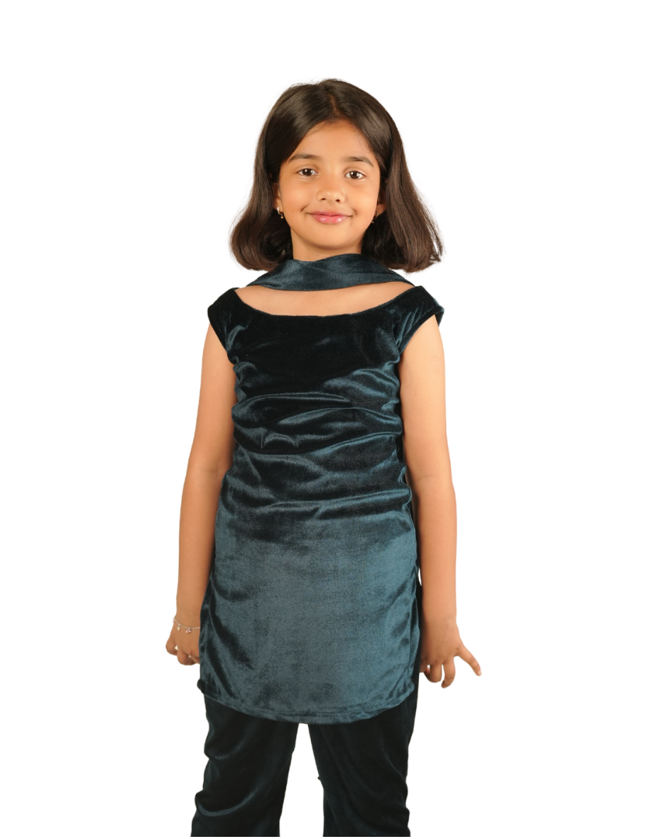 Young girl wearing a teal velvet dress on a white background