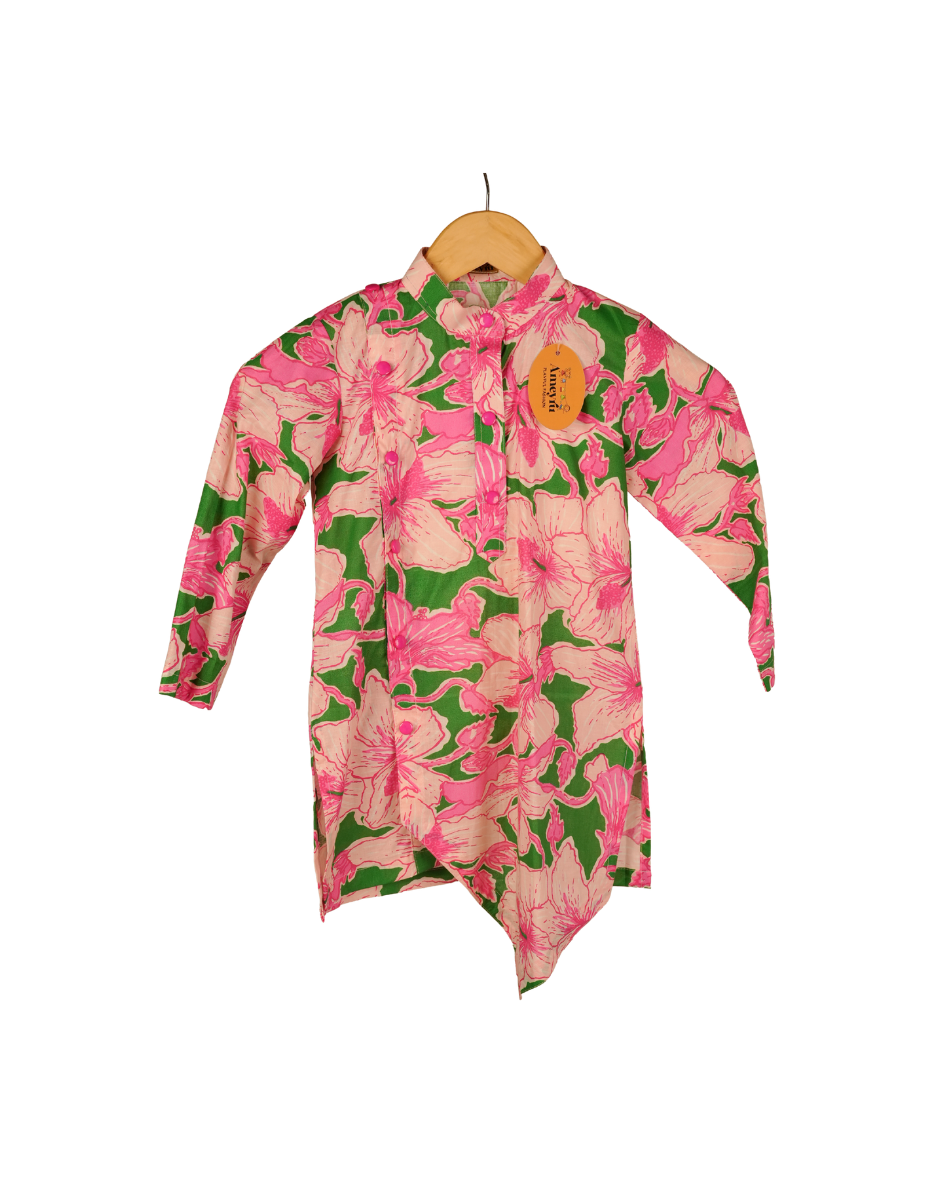 Floral patterned shirt on a hanger with a white background