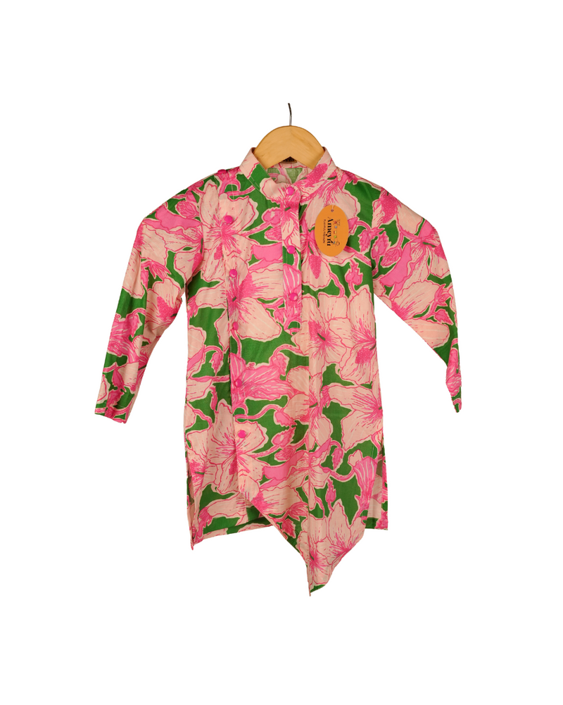 Floral patterned shirt on a hanger with a white background