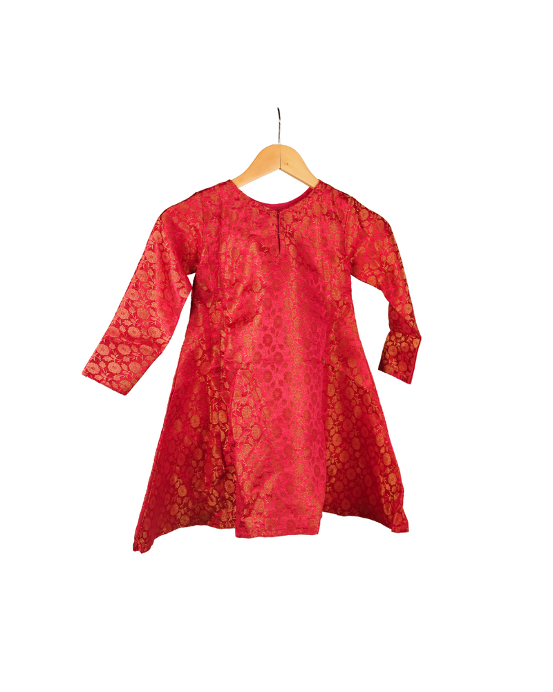 Red dress with floral pattern on a hanger against a white background