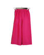 Pink wide-leg pants on a hanger against a white background