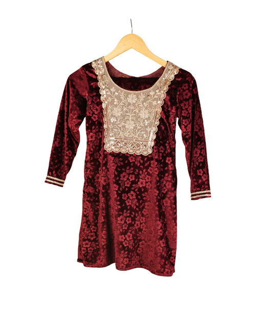 Red floral dress with lace neckline on a hanger against a white background