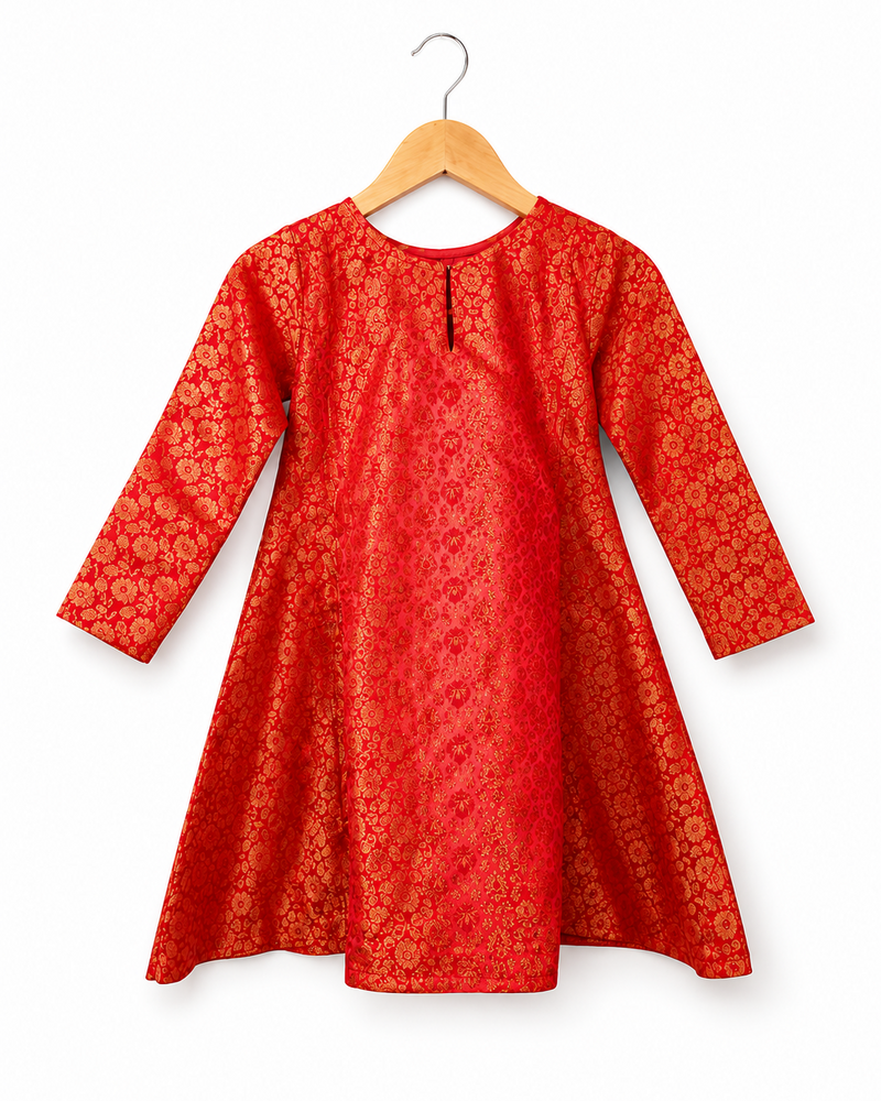 Red patterned dress on a wooden hanger against a white background