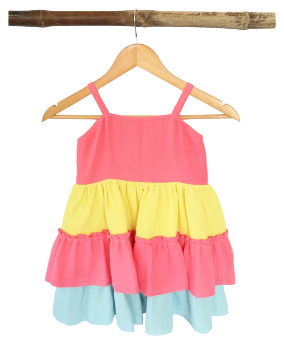 A multicolored sleeveless cotton frock with a square neckline and tiered design, displayed on a wooden hanger.