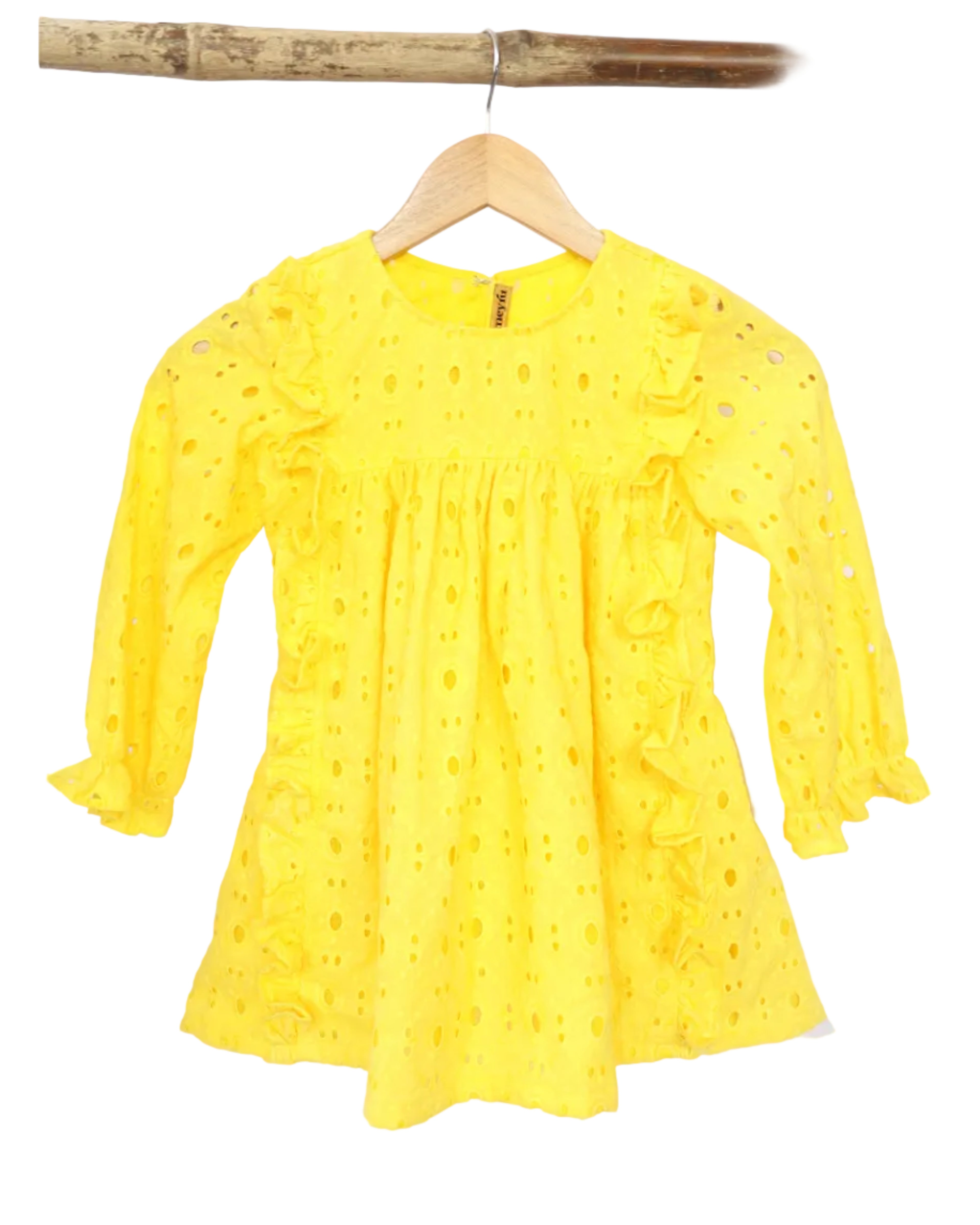 A yellow kids' cotton frock with a floral pattern, displayed on a hanger.