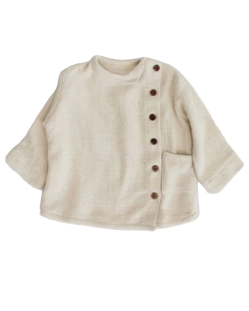 Beige baby sweater with buttons on a white background