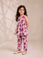 Ameyru Kids Wear girl wearing a sleeveless floral peplum top and matching straight-leg trousers in magenta and white.