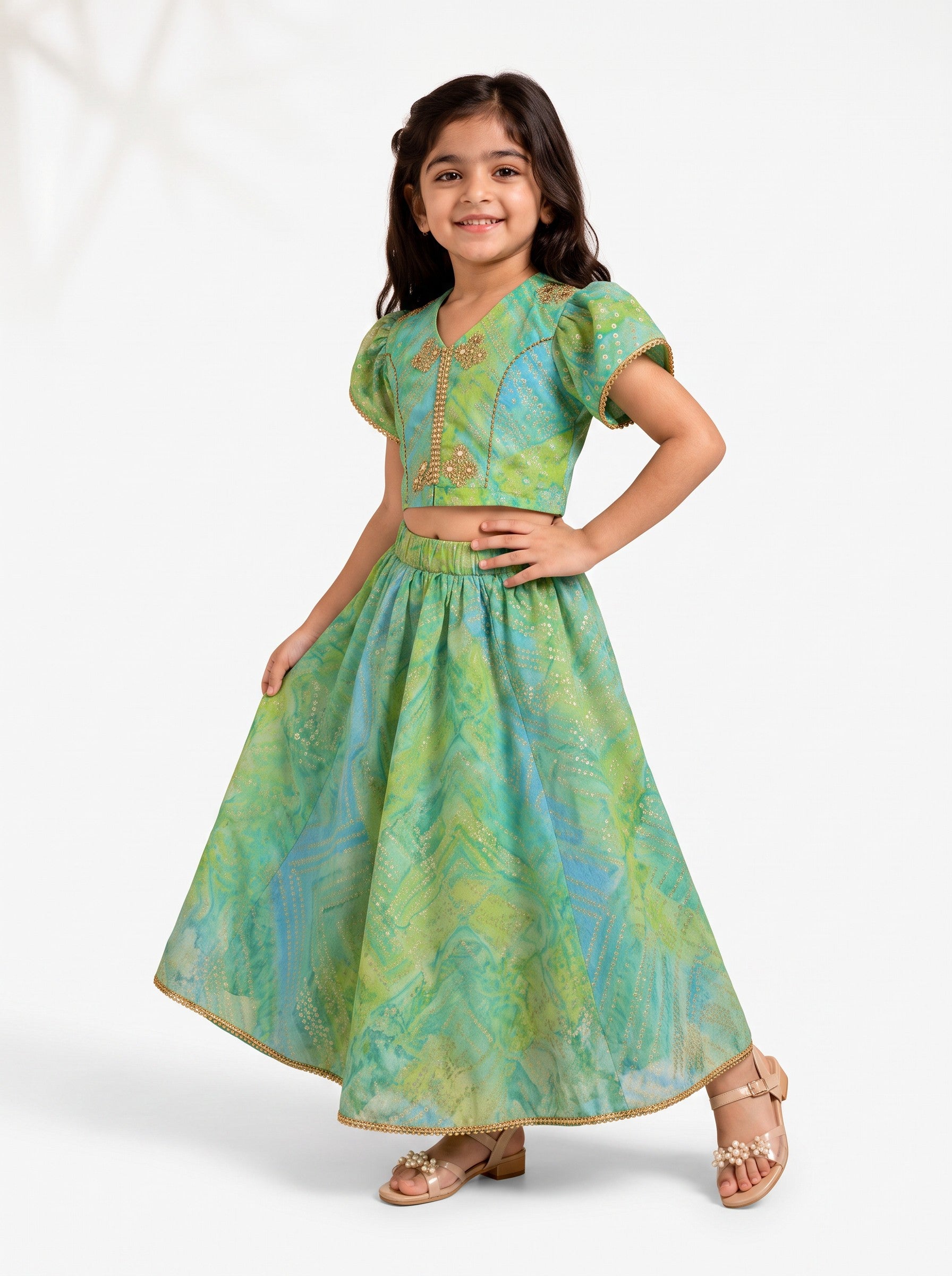 Ameyru Kids Wear green and blue printed lehenga choli with puff sleeves and gold embroidery for festive occasions