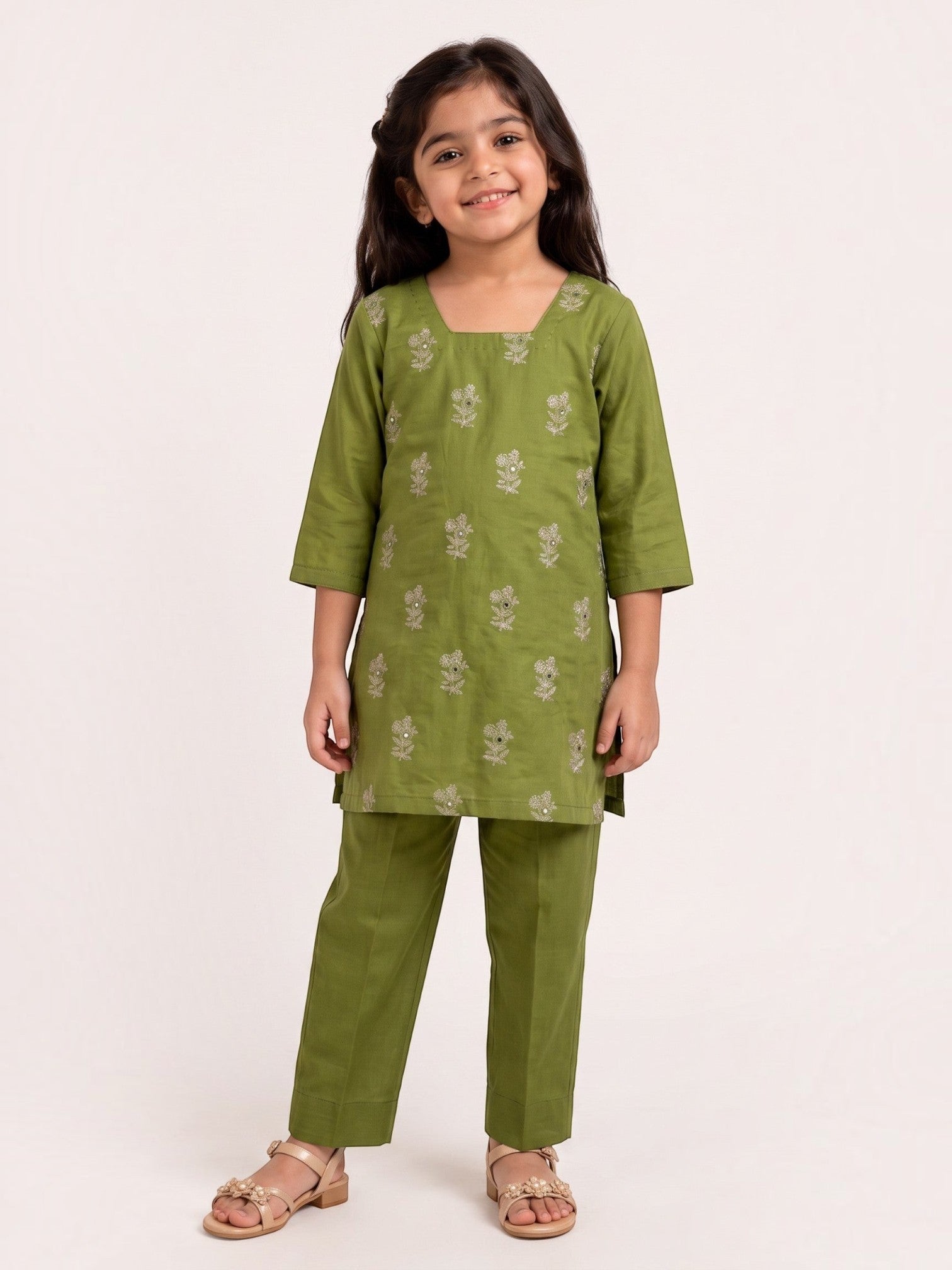 Young girl wearing an Ameyru Kids Wear olive green kurta set with floral embroidery and matching straight trousers.