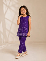 Ameyru Kids Wear purple sleeveless kurta and pant set with white geometric print worn by a smiling young girl