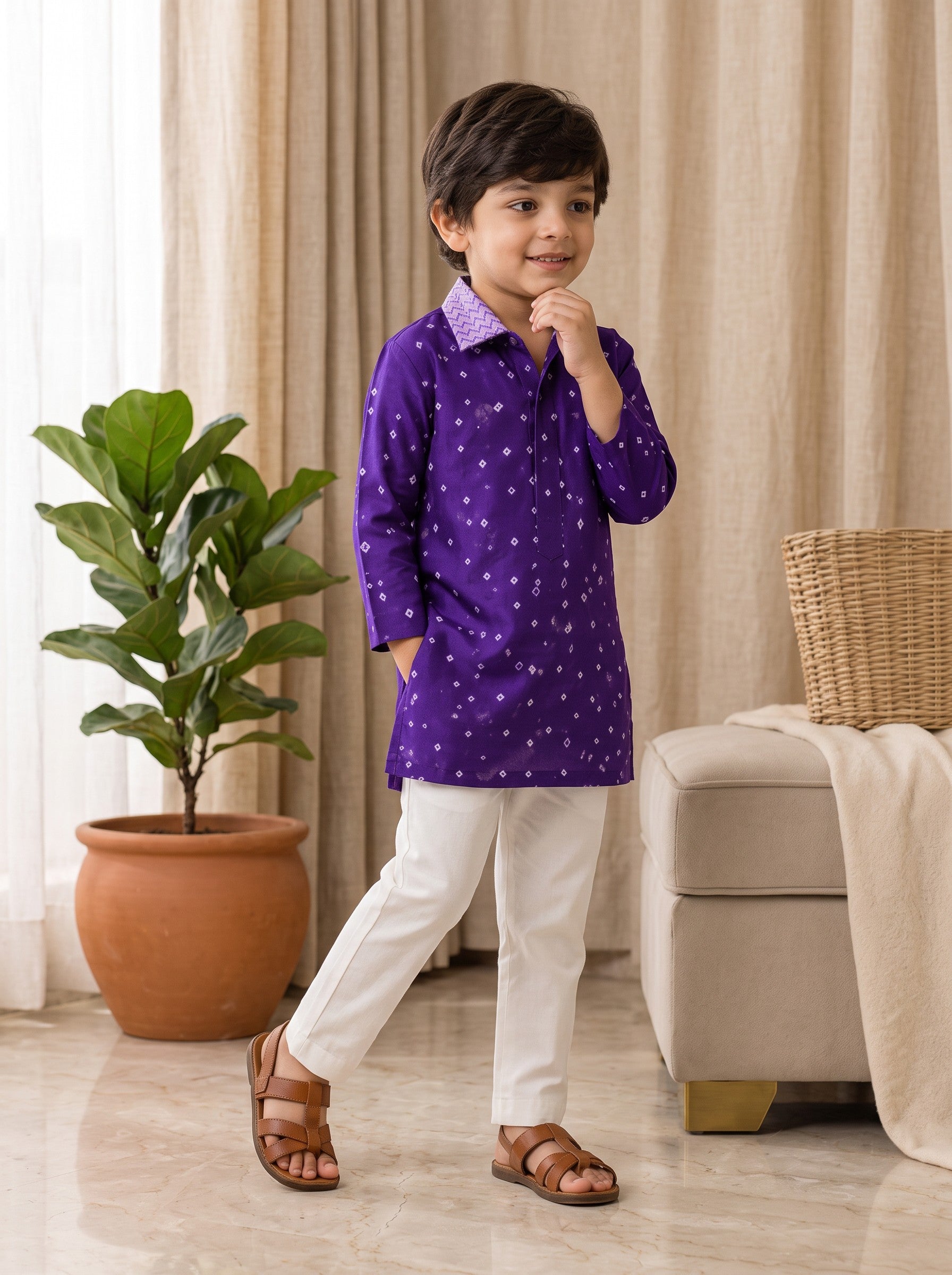 Ameyru Kids Wear boy in a deep purple patterned kurta with white trousers and brown sandals for festive occasions.