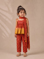Ameyru Kids Wear red and yellow ethnic bandhani print top and trousers set with a matching scarf on a young girl.
