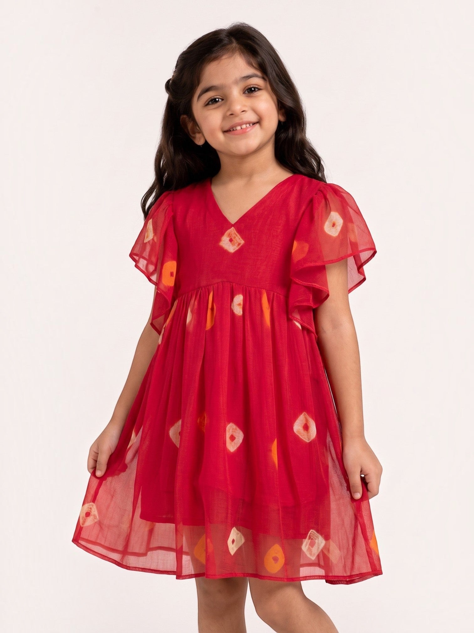 Ameyru Kids Wear red flutter sleeve dress with diamond print on a smiling young girl
