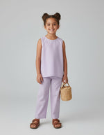 Baby Kids Cloths Ameyru lavender pure cotton co-ord set worn by a smiling girl with a small woven basket bag