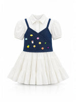 Baby Kids Cloths girls layered dress with white puff-sleeve blouse, denim bodice, and colorful whimsical charms.